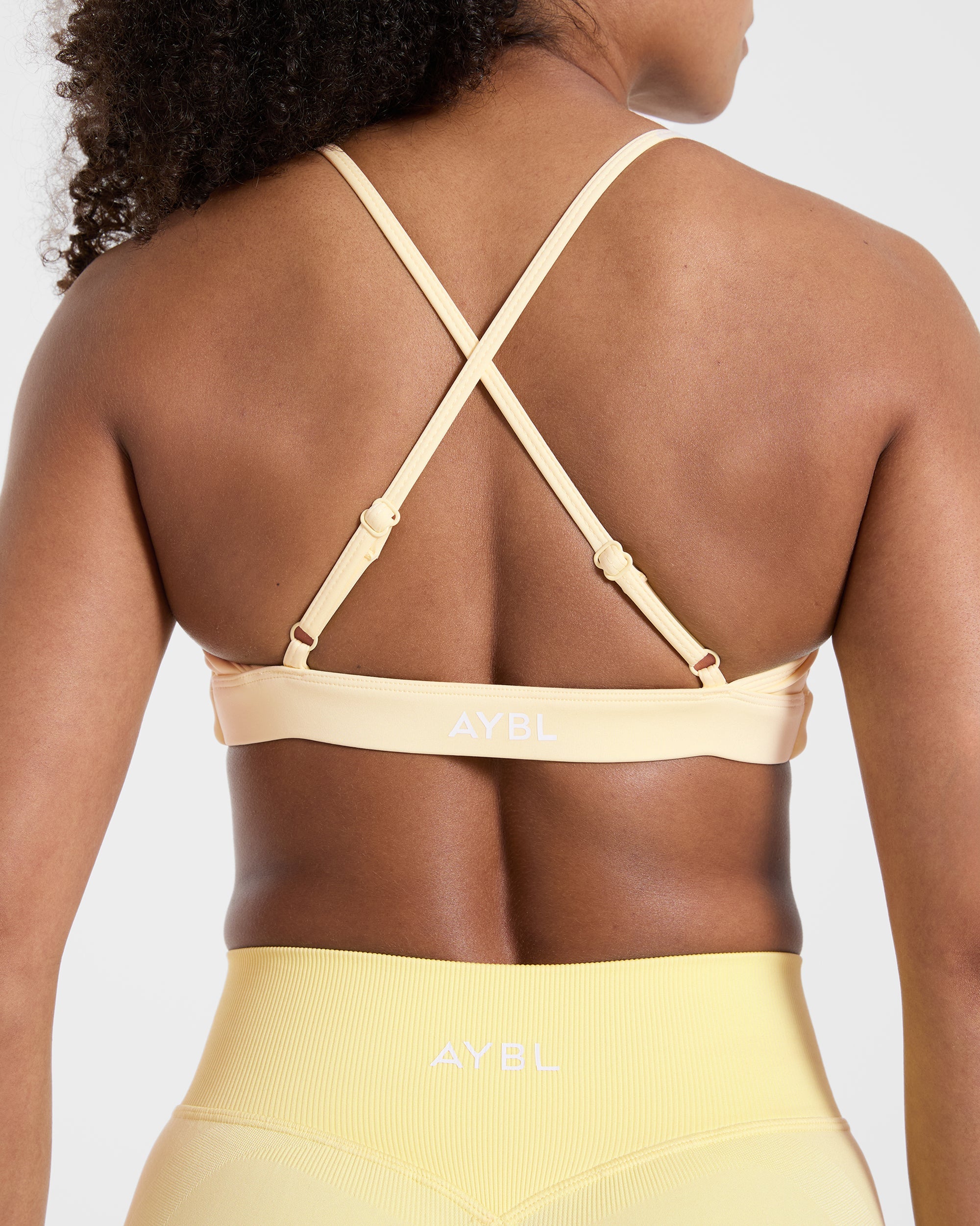 Essential Twist Crossback Sports Bra - Yellow