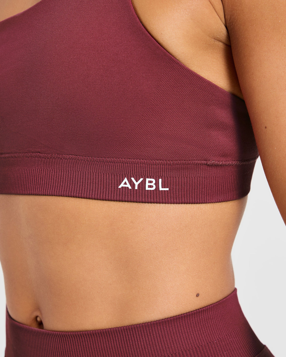 Enhance Seamless One Shoulder Sports Bra - Mahogany Red